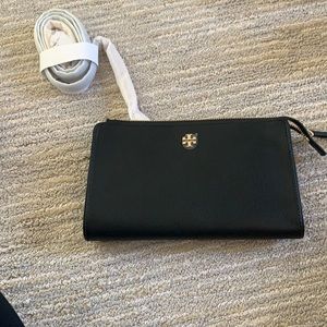 Never worn. Perfect condition. Cross body.